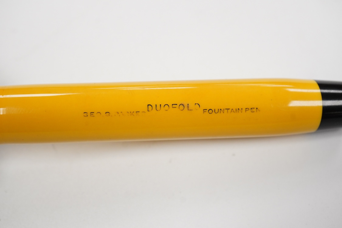 A Parker Lucky Curve Duofold Senior in mandarin yellow with 14ct Duofold nib